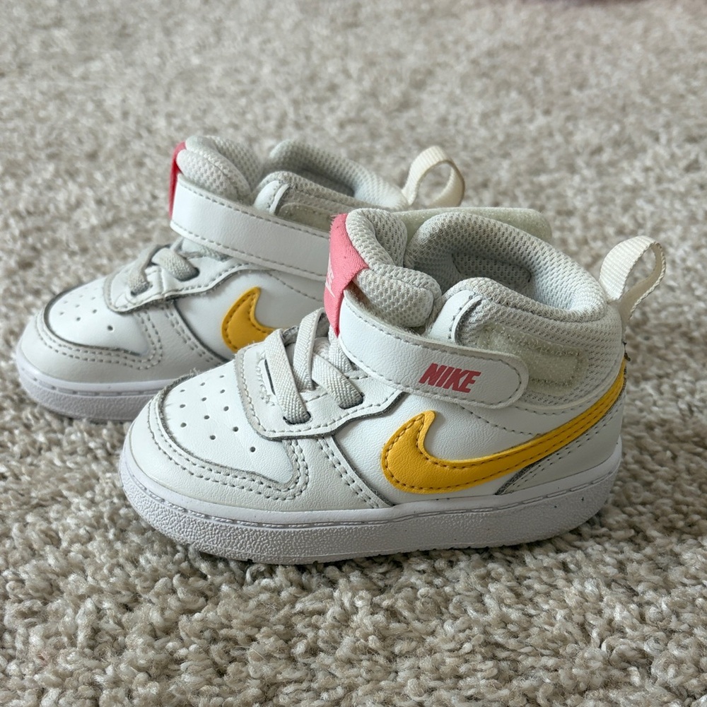 Nike Kids White Sneakers with Yellow and Pink Accents